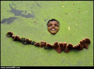 Indian Boy Floating on water